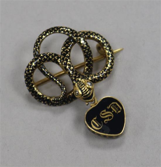 A William IV yellow metal, black enamel and diamond set brooch, modelled as a coiled serpent with heart shaped drop.